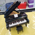 21323 Grand Piano including Power Up (Previously Owned) product image 1, provided for visual reference and product detail